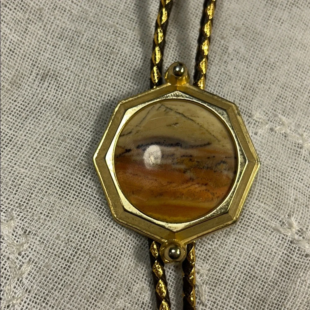 Vintage Bolo tie western leather, with ornate medallion, space for silver dollar